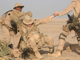 Members of 2nd Battalion, 8th Marines, prepare to board helicopters at Forward Operating Base Dwyer, Afghanistan, in 2009.